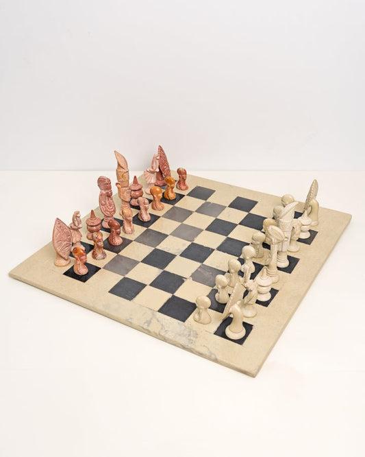Handcarved African soapstone chess set — artisan stone board game with tribal motif pieces, Kenya