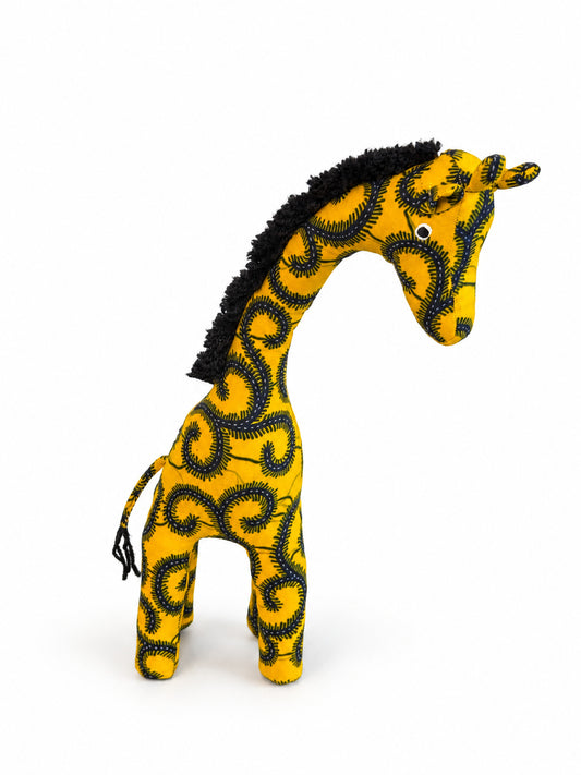 Large yellow African print giraffe decoration, side view with tasselled tail, handmade in Ghana