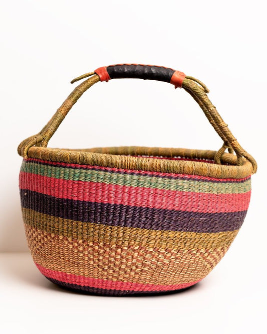 Obaa Sima hand-woven round basket — Woman of Substance, vibrant ethical Ghanaian artisan basket