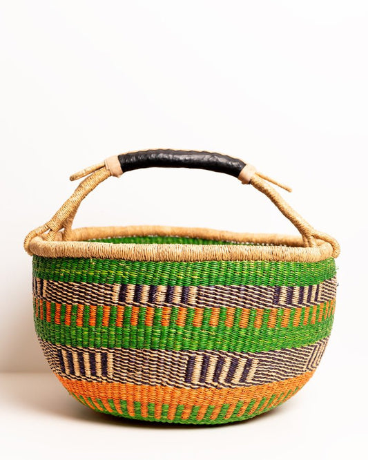 Obaa Sima hand-woven round basket — Woman of Substance, vibrant ethical Ghanaian artisan basket