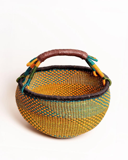 Obaa Sima hand-woven round basket — Woman of Substance, vibrant ethical Ghanaian artisan basket
