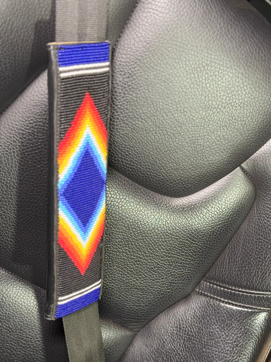 Nathez hand-beaded seat belt cover with Maasai beadwork — Kenyan leather-backed artisan car accessory