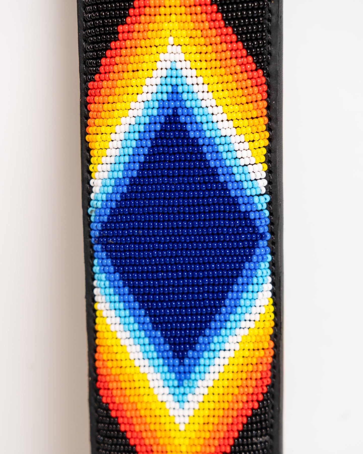 Nathez hand-beaded leather seatbelt cover — Maasai African artisan beadwork car accessory