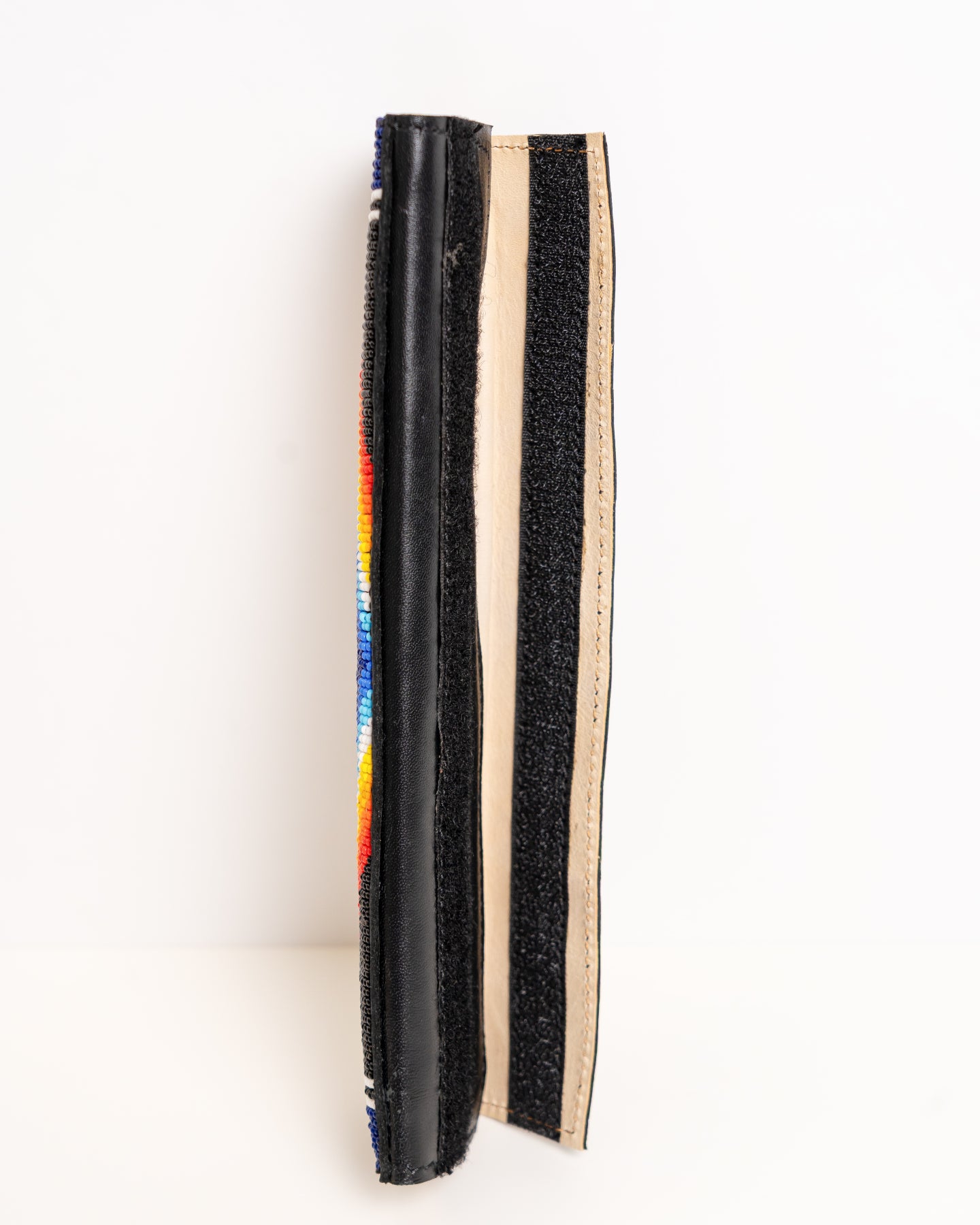 Nathez hand-beaded leather seatbelt cover — Maasai African artisan beadwork car accessory