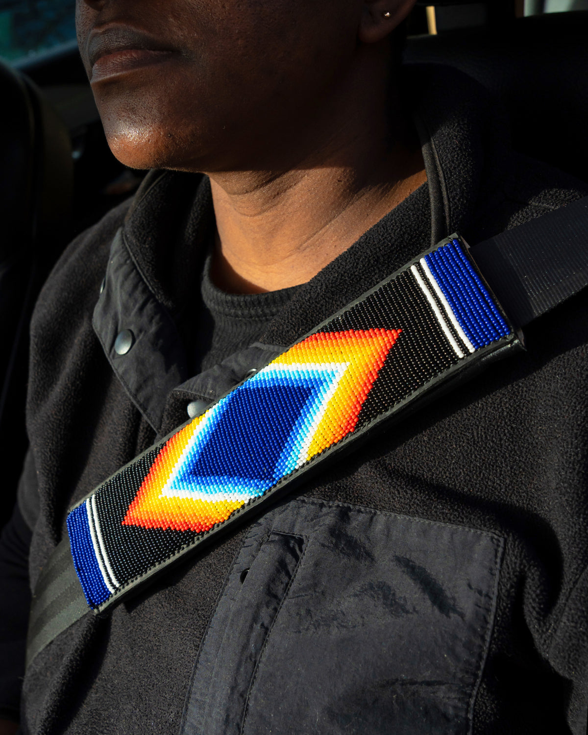 Nathez hand-beaded leather seatbelt cover — Maasai African artisan beadwork car accessory