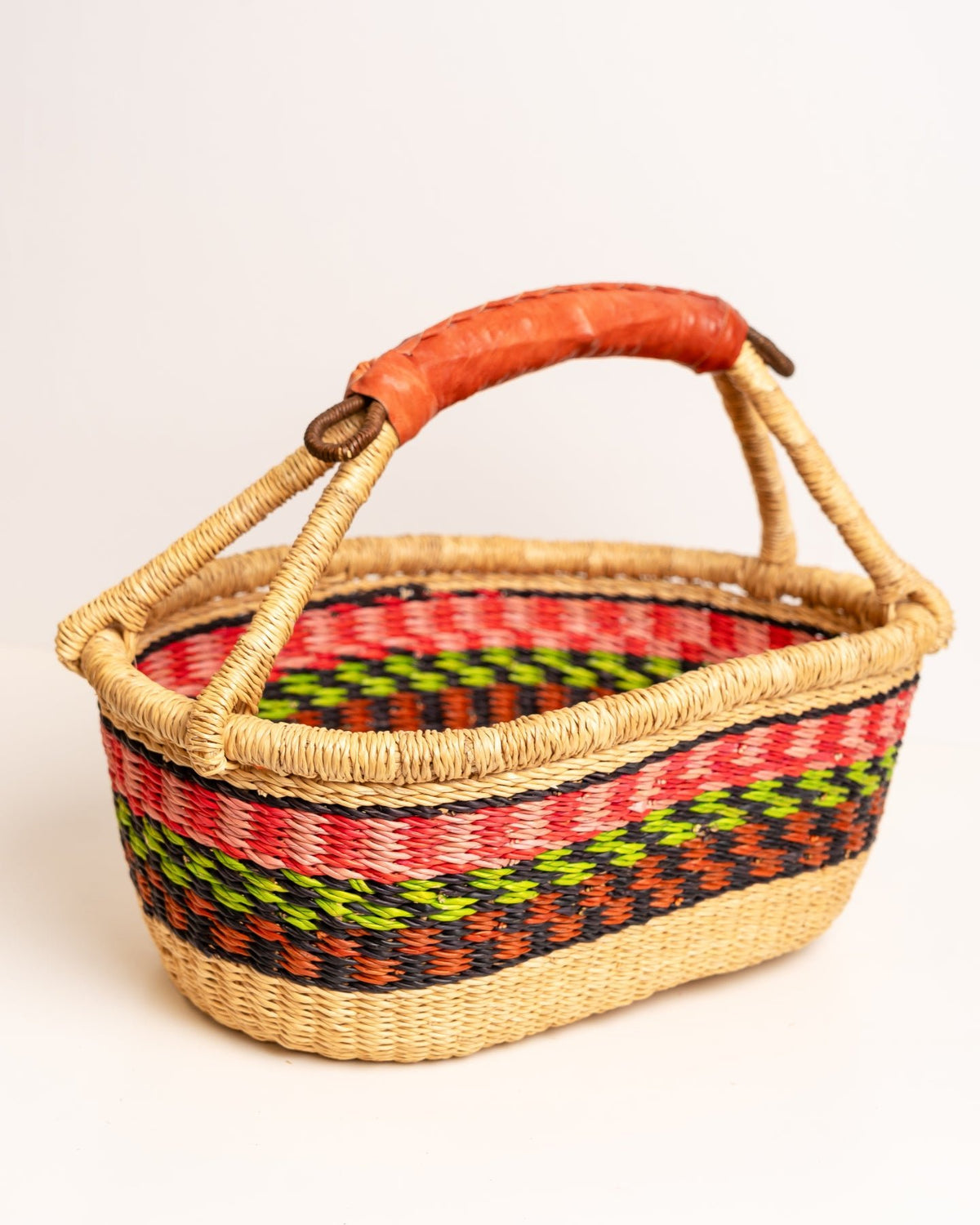 AKUA hand-woven Bolga market basket with leather handle — fair trade ethical Ghanaian elephant grass craft