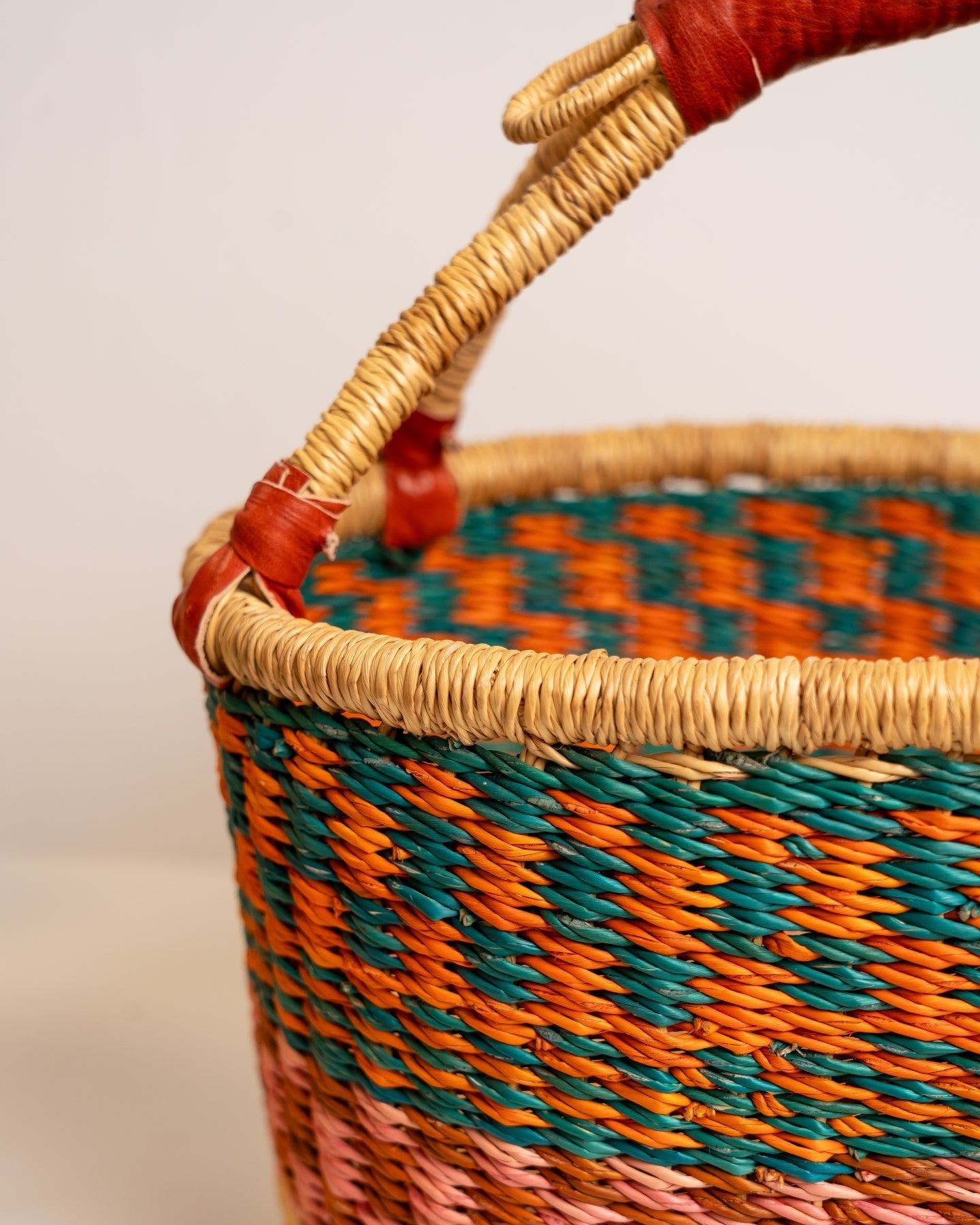 AKUA hand-woven Bolga market basket with leather handle — fair trade ethical Ghanaian elephant grass craft