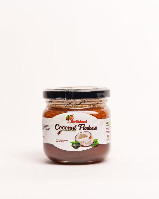 Bee Natural coconut flakes infused raw honey from Kenya — natural unprocessed artisan honey