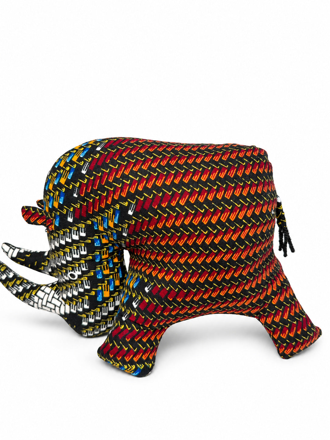 Handmade Ankara print rhino in black with red, yellow, blue and white zigzag pattern, made in Ghana