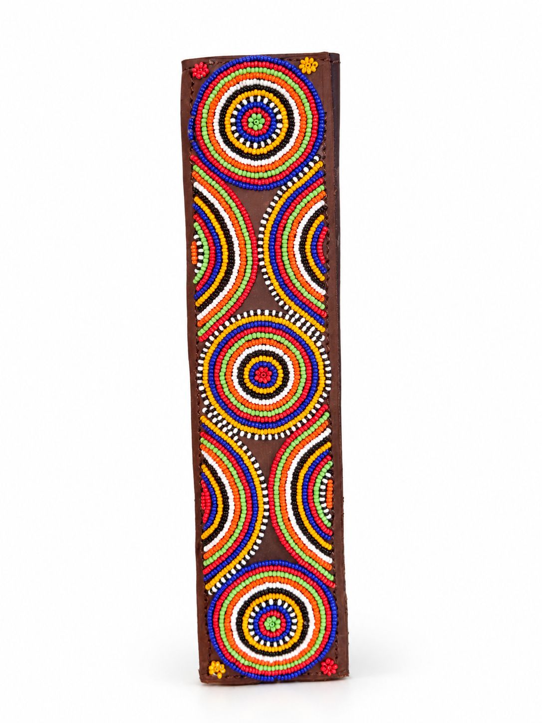 Side view of a brown beaded seat belt cover showing the leather edging