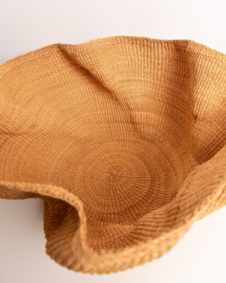 Hand-woven wavy basket — unique African artisan woven storage basket, ethically made Ghana