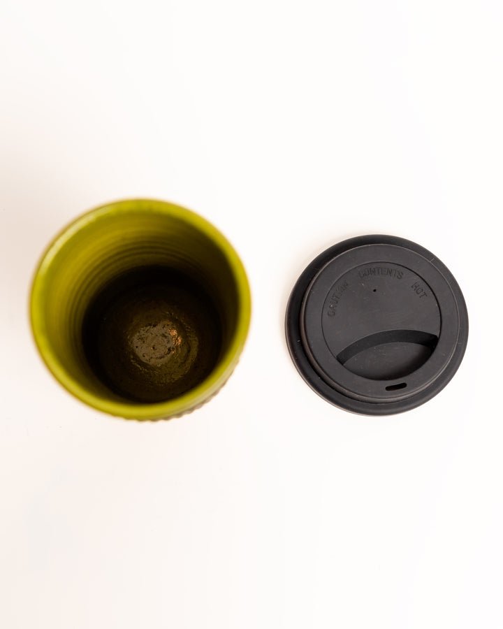 Hand-crafted neem wood tumbler — natural artisan kitchenware from Africa