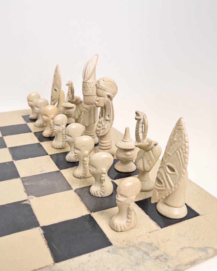 Handcarved African soapstone chess set — artisan stone board game with tribal motif pieces, Kenya