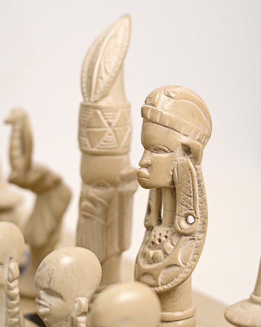 Handcarved African soapstone chess set — artisan stone board game with tribal motif pieces, Kenya