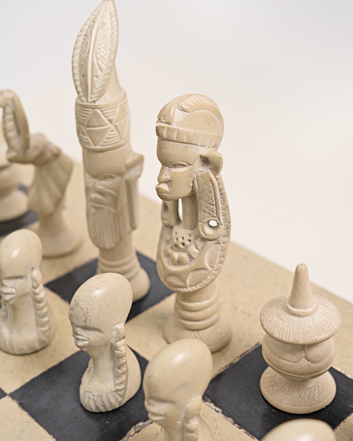 Handcarved African soapstone chess set — artisan stone board game with tribal motif pieces, Kenya