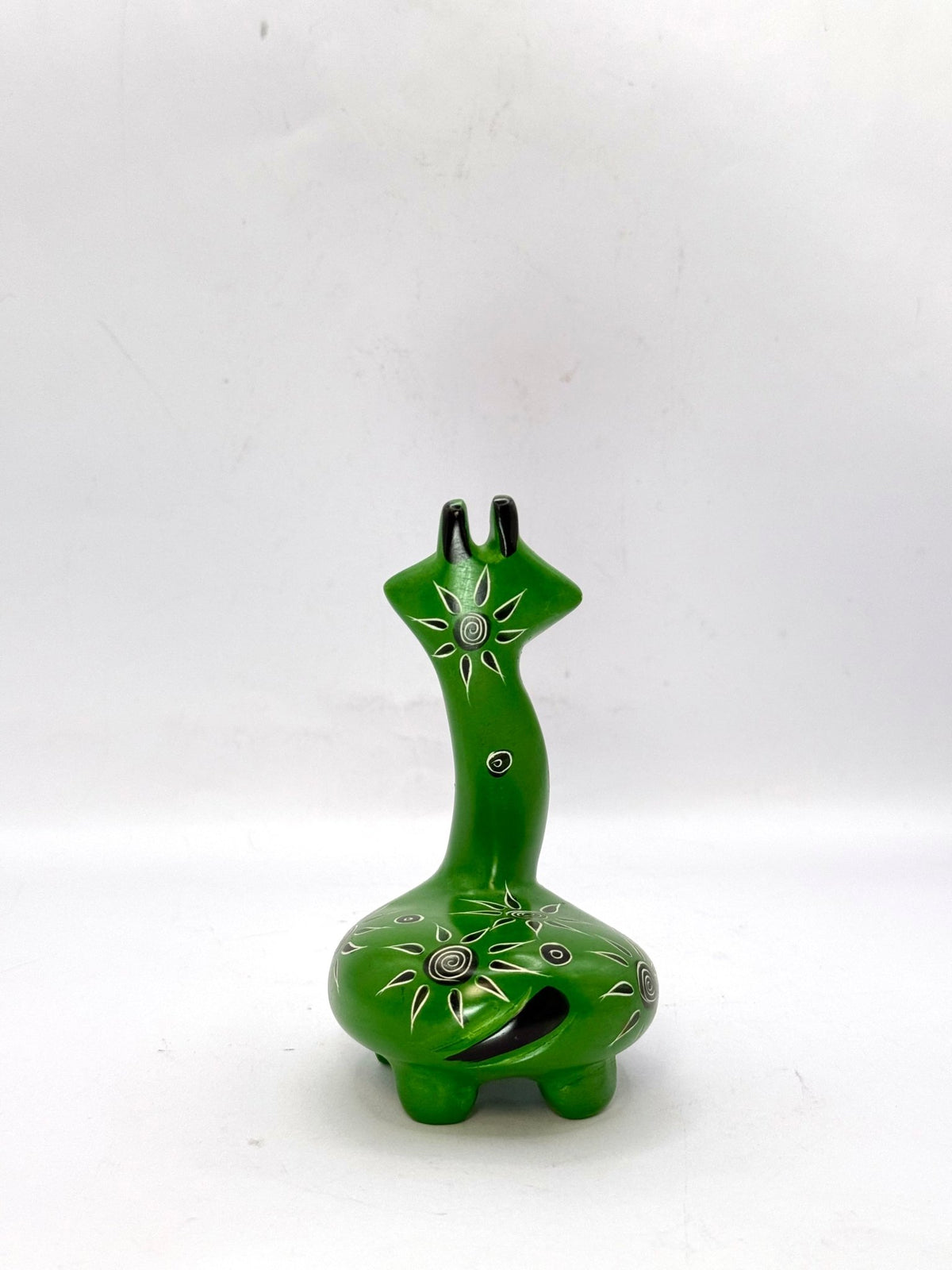 Handcrafted African soapstone giraffe — green figurine with tribal patterns, ethical Kenyan decor