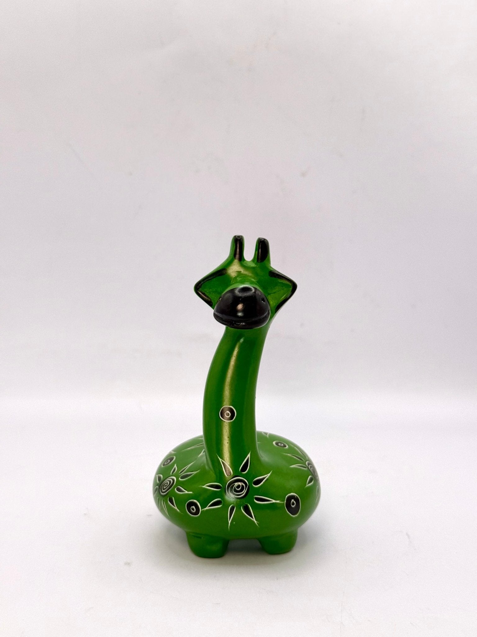 Handcrafted African soapstone giraffe — green figurine with tribal patterns, ethical Kenyan decor