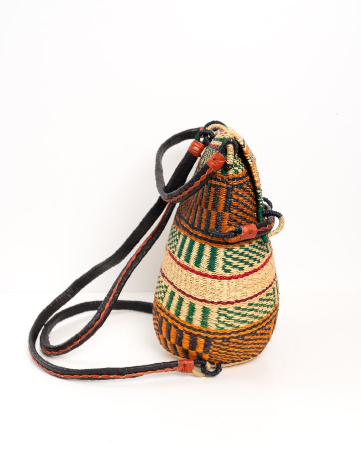 Hand-woven Bolga rucksack — ethical African straw backpack, Ghanaian artisan craftsmanship