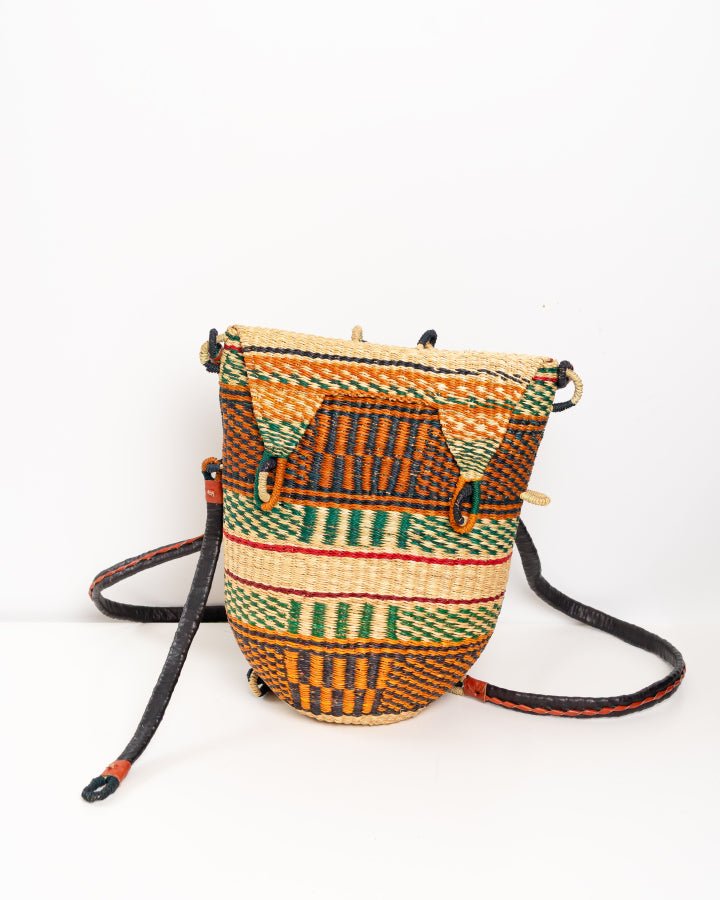 Hand-woven Bolga rucksack — ethical African straw backpack, Ghanaian artisan craftsmanship