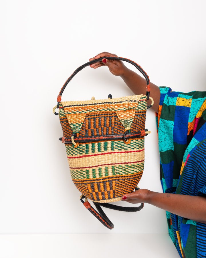 Hand-woven Bolga rucksack — ethical African straw backpack, Ghanaian artisan craftsmanship