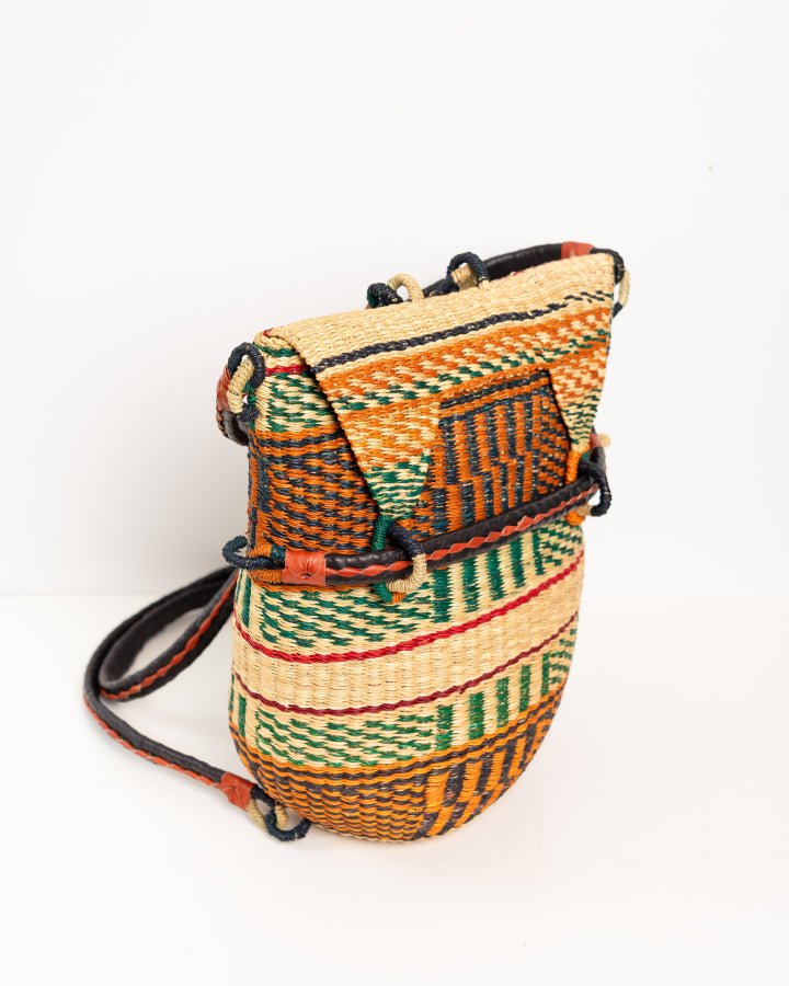 Hand-woven Bolga rucksack — ethical African straw backpack, Ghanaian artisan craftsmanship