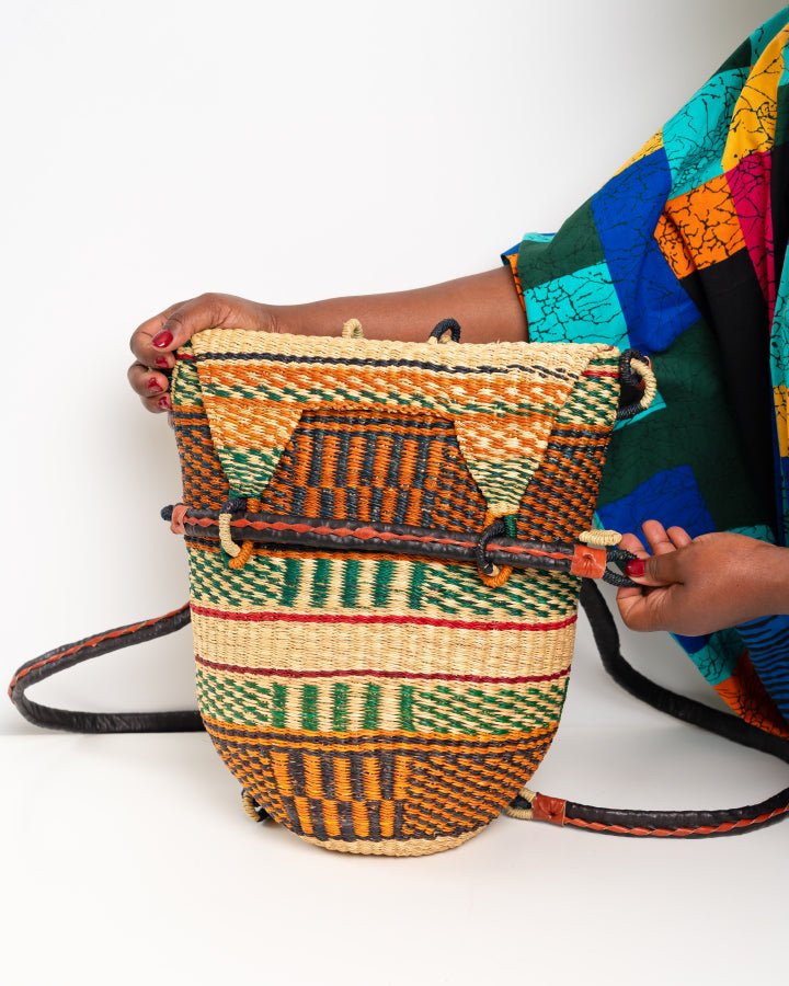 Hand-woven Bolga rucksack — ethical African straw backpack, Ghanaian artisan craftsmanship