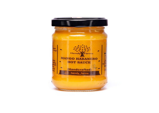 Hendy Farms Mango Habanero Hot Sauce in glass jar, vegan handcrafted hot sauce, Ghana