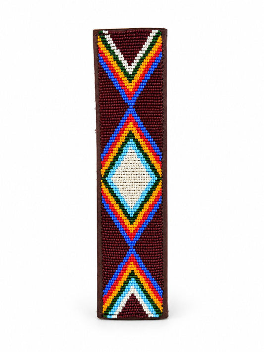 Maroon Maasai beaded seat belt cover with rainbow chevrons and a cream diamond, handmade in Kenya