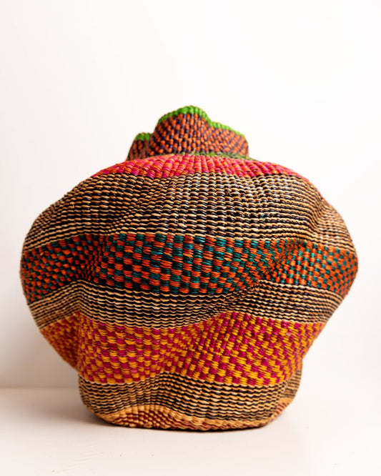 Nathez hand-woven wavy planter — sustainable African artisan woven plant pot holder