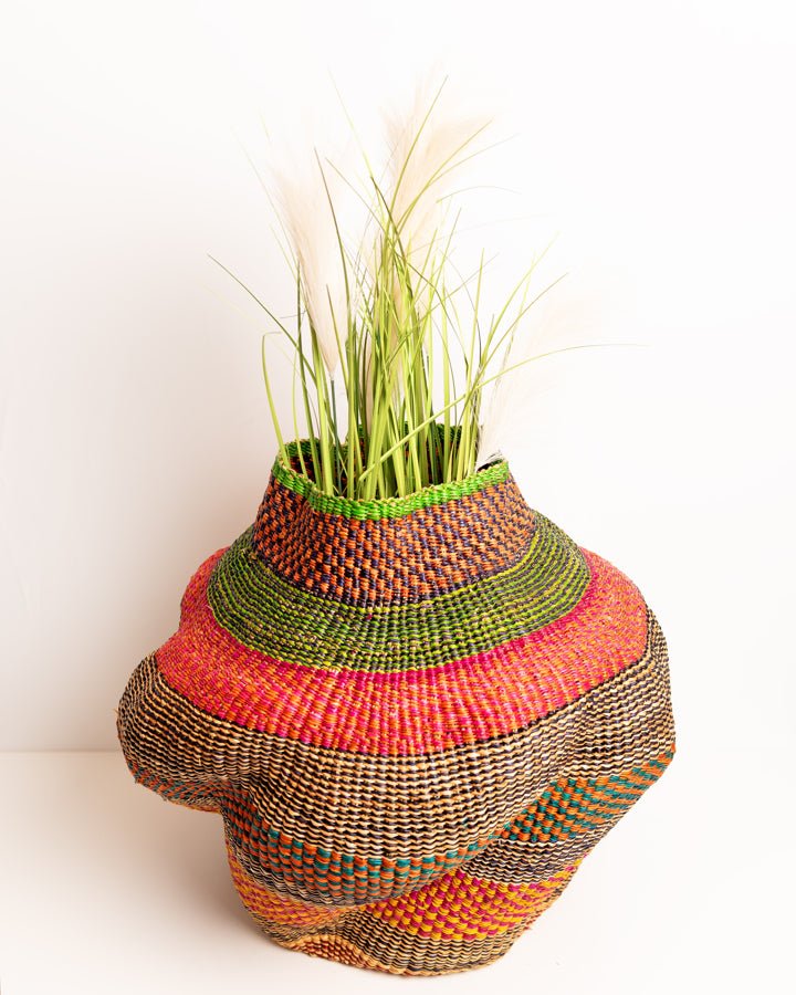 Nathez hand-woven wavy planter — sustainable African artisan woven plant pot holder