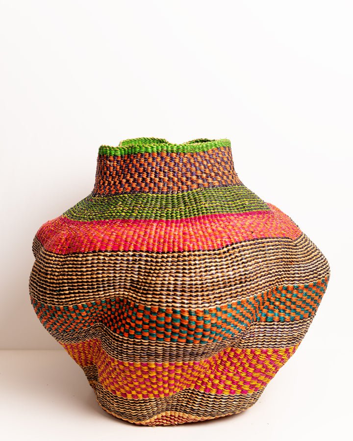 Nathez hand-woven wavy planter — sustainable African artisan woven plant pot holder