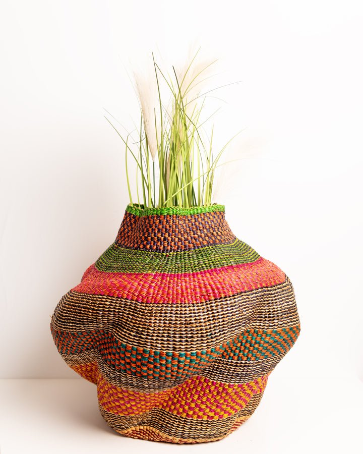Nathez hand-woven wavy planter — sustainable African artisan woven plant pot holder