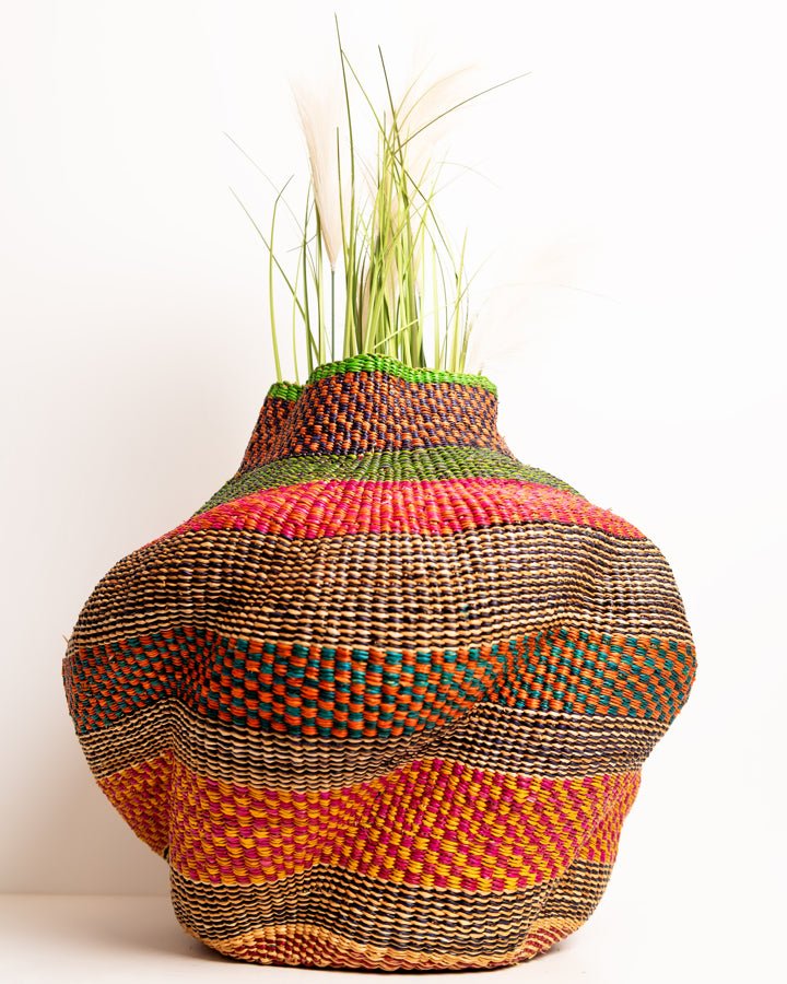 Nathez hand-woven wavy planter — sustainable African artisan woven plant pot holder