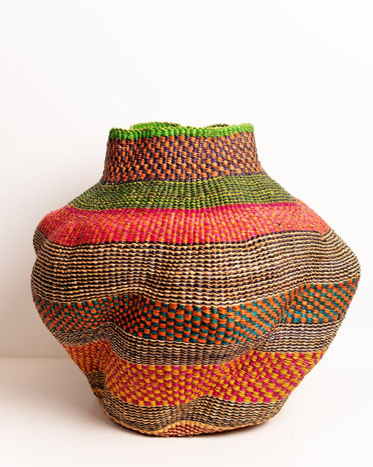 Nathez hand-woven wavy planter — sustainable African artisan woven plant pot holder