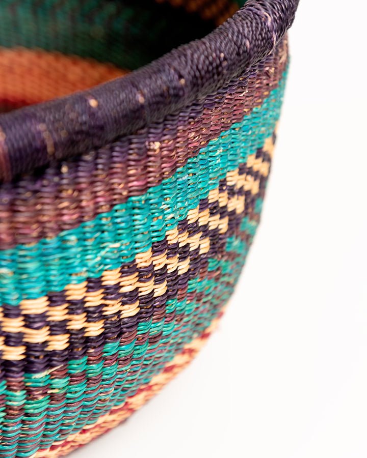 Obaa Sima hand-woven round basket — Woman of Substance, vibrant ethical Ghanaian artisan basket