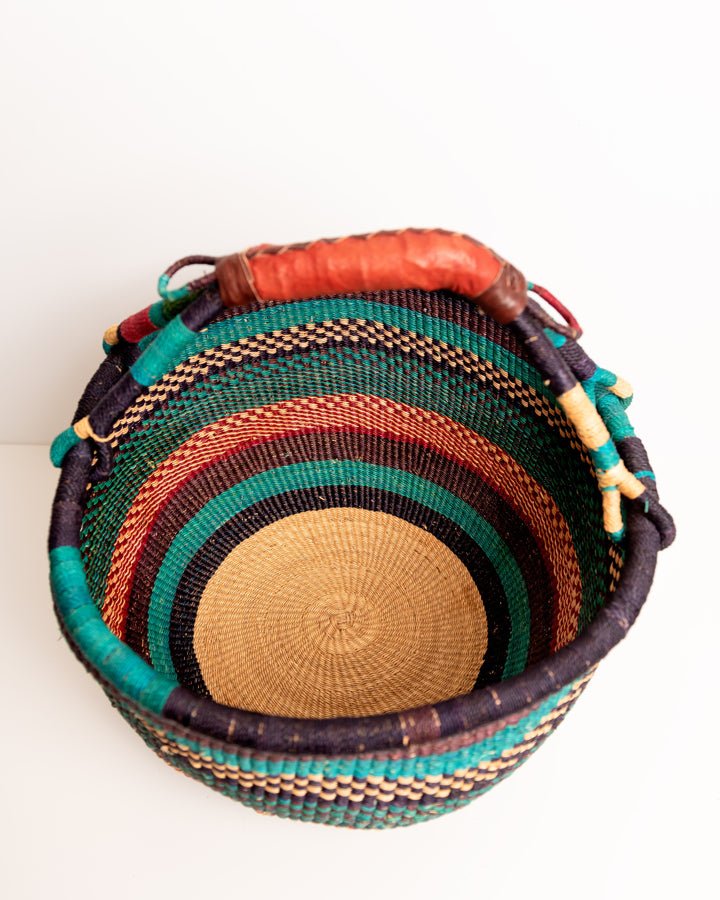 Obaa Sima hand-woven round basket — Woman of Substance, vibrant ethical Ghanaian artisan basket