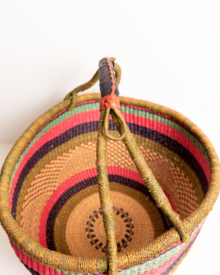 Obaa Sima hand-woven round basket — Woman of Substance, vibrant ethical Ghanaian artisan basket