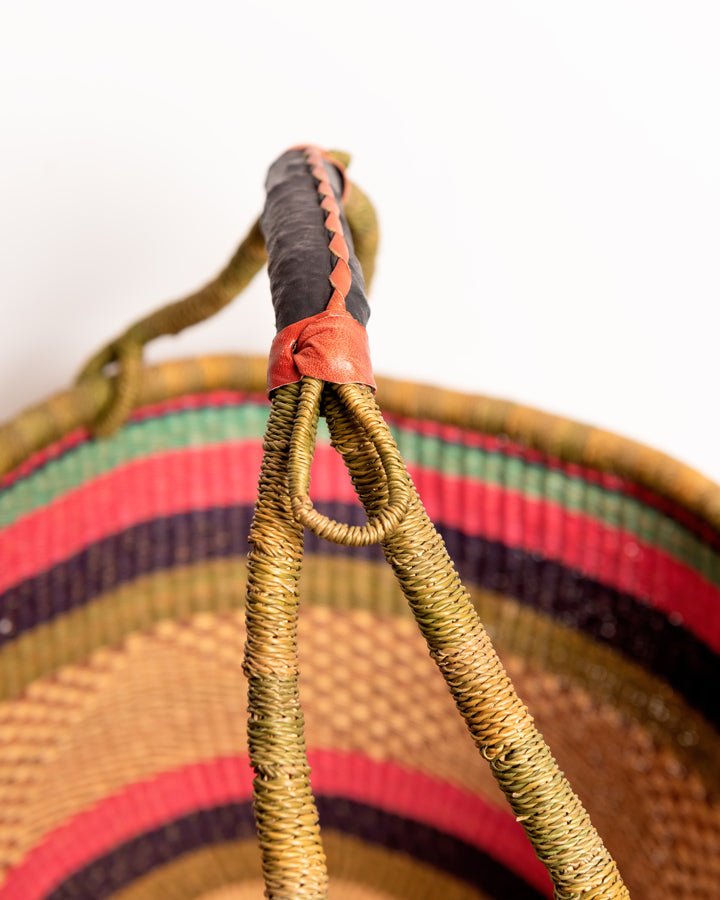 Obaa Sima hand-woven round basket — Woman of Substance, vibrant ethical Ghanaian artisan basket
