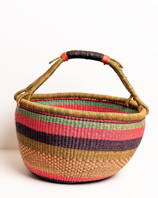 Obaa Sima hand-woven round basket — Woman of Substance, vibrant ethical Ghanaian artisan basket