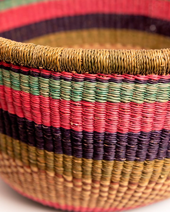 Obaa Sima hand-woven round basket — Woman of Substance, vibrant ethical Ghanaian artisan basket