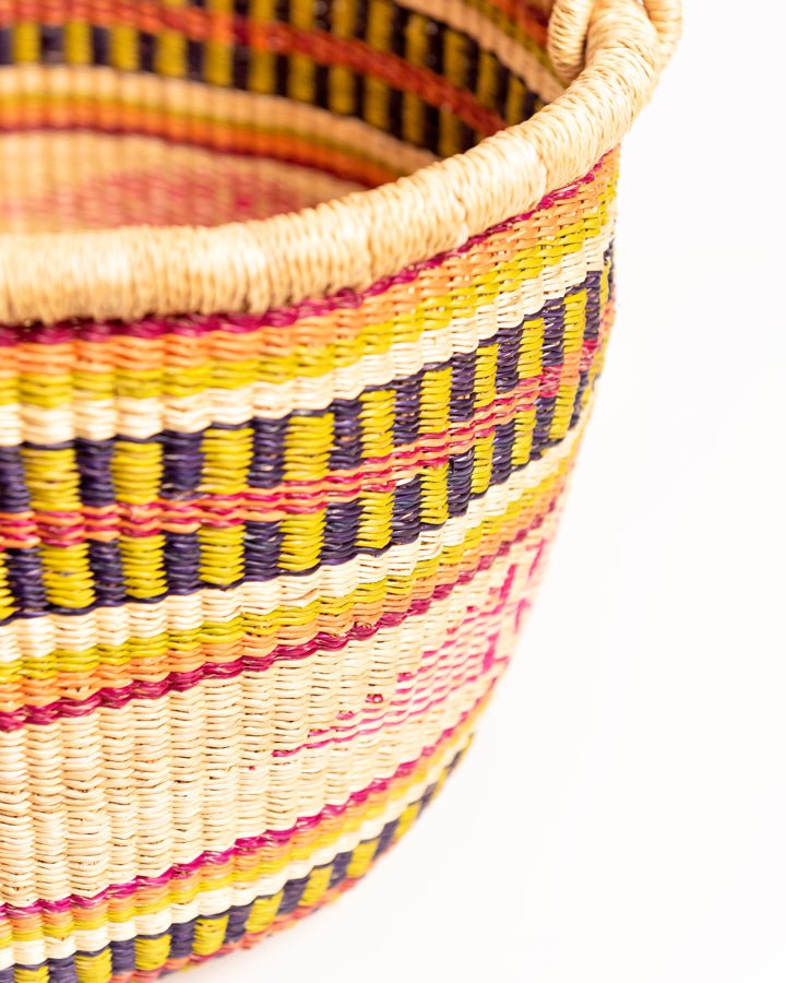 Obaa Sima hand-woven round basket — Woman of Substance, vibrant ethical Ghanaian artisan basket