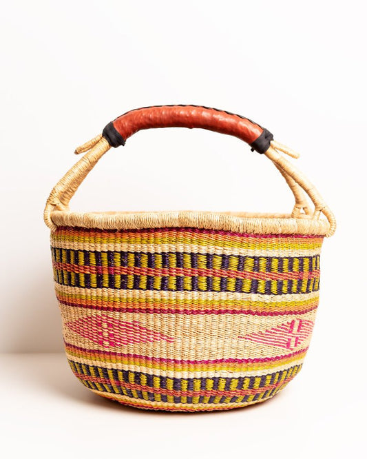 Obaa Sima hand-woven round basket — Woman of Substance, vibrant ethical Ghanaian artisan basket