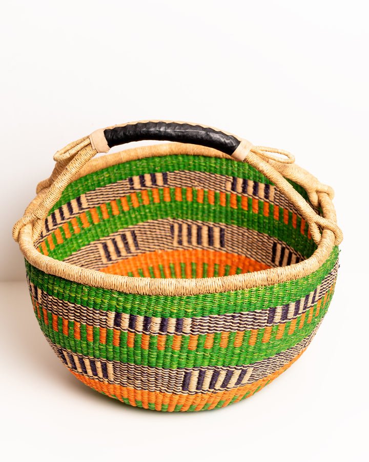 Obaa Sima hand-woven round basket — Woman of Substance, vibrant ethical Ghanaian artisan basket