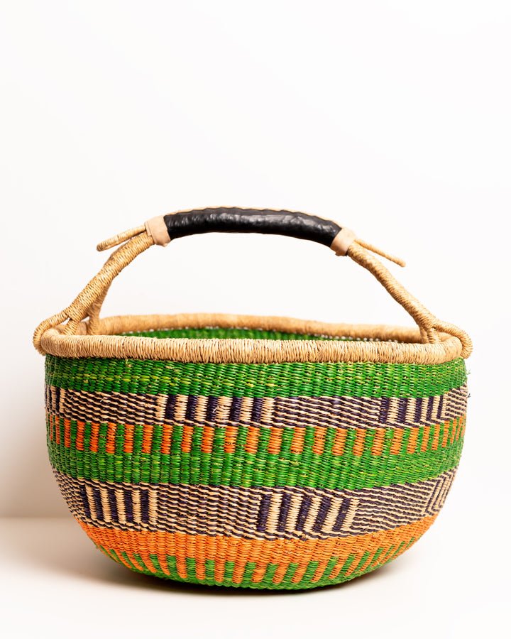 Obaa Sima hand-woven round basket — Woman of Substance, vibrant ethical Ghanaian artisan basket