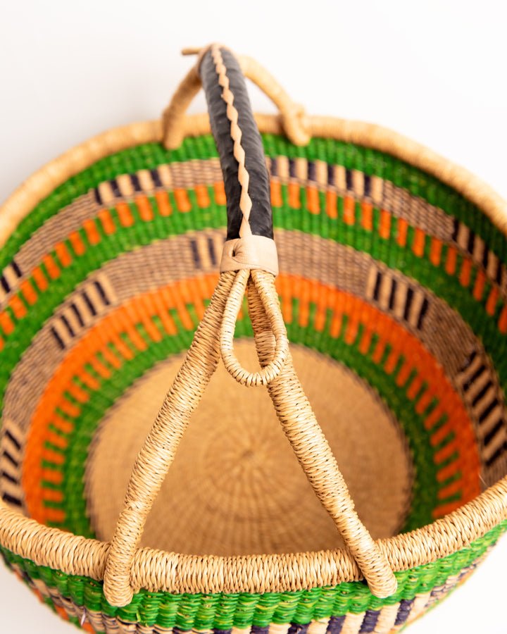 Obaa Sima hand-woven round basket — Woman of Substance, vibrant ethical Ghanaian artisan basket