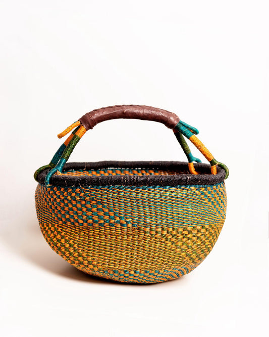 Obaa Sima hand-woven round basket — Woman of Substance, vibrant ethical Ghanaian artisan basket