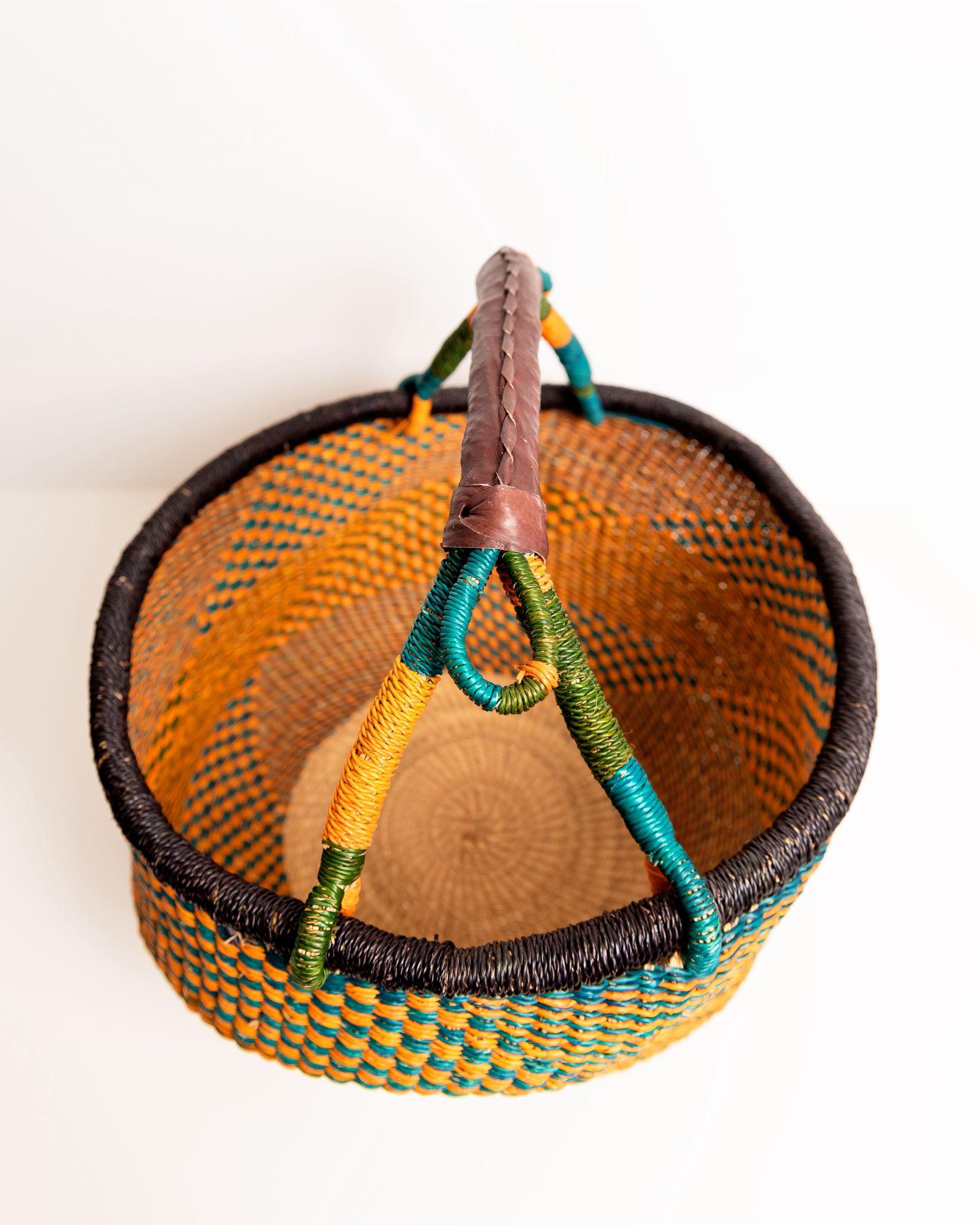 Obaa Sima hand-woven round basket — Woman of Substance, vibrant ethical Ghanaian artisan basket