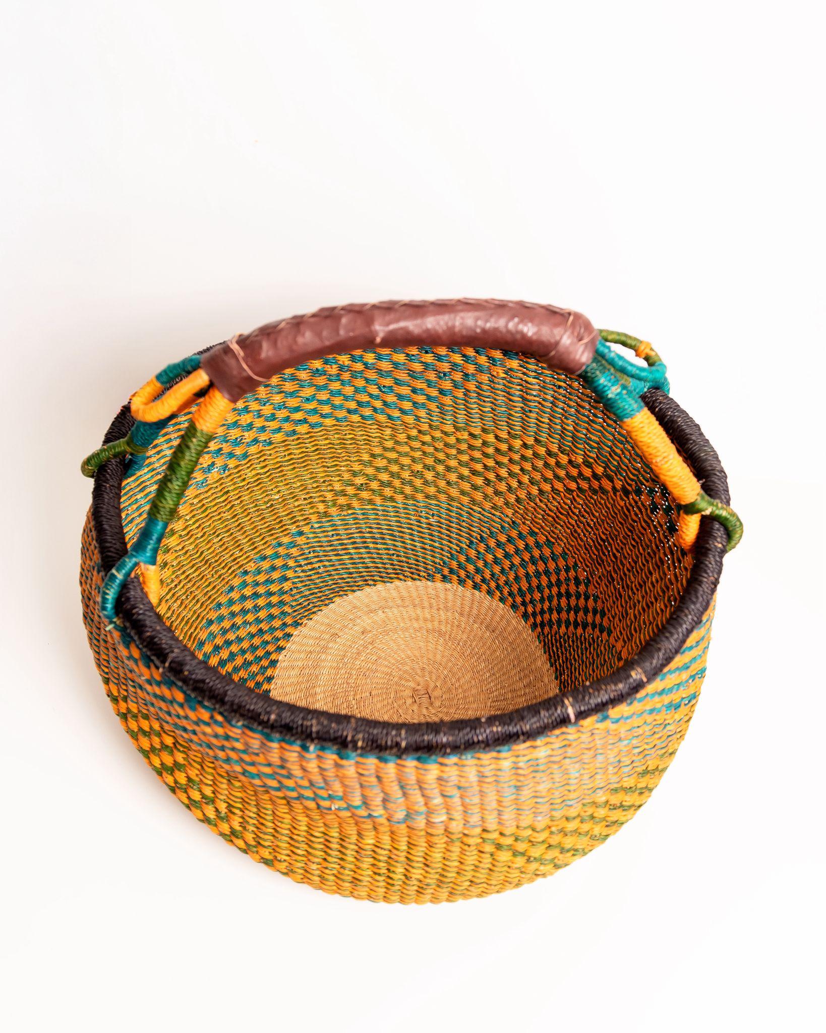Obaa Sima hand-woven round basket — Woman of Substance, vibrant ethical Ghanaian artisan basket