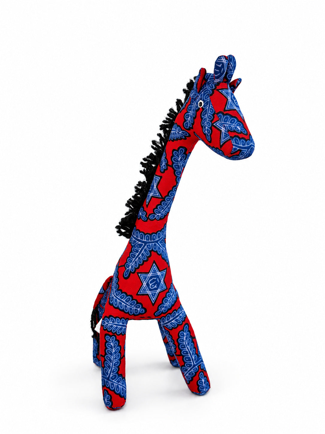 Red Ankara giraffe decoration with blue leaf and star print, three-quarter view