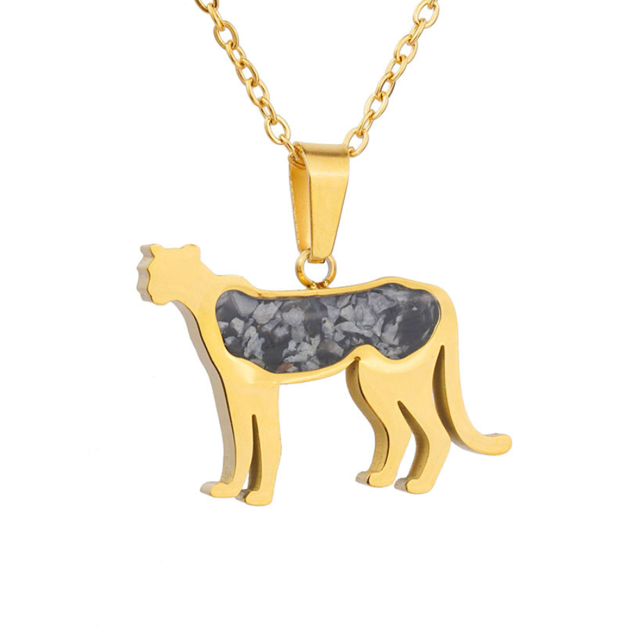 Gold-plated cheetah pendant necklace with a snowflake obsidian inlay on a gold chain, on a plain white background